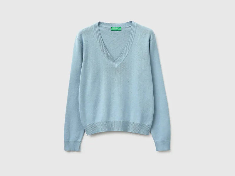 Maglia azzurra in cotone tricot con scollo a V