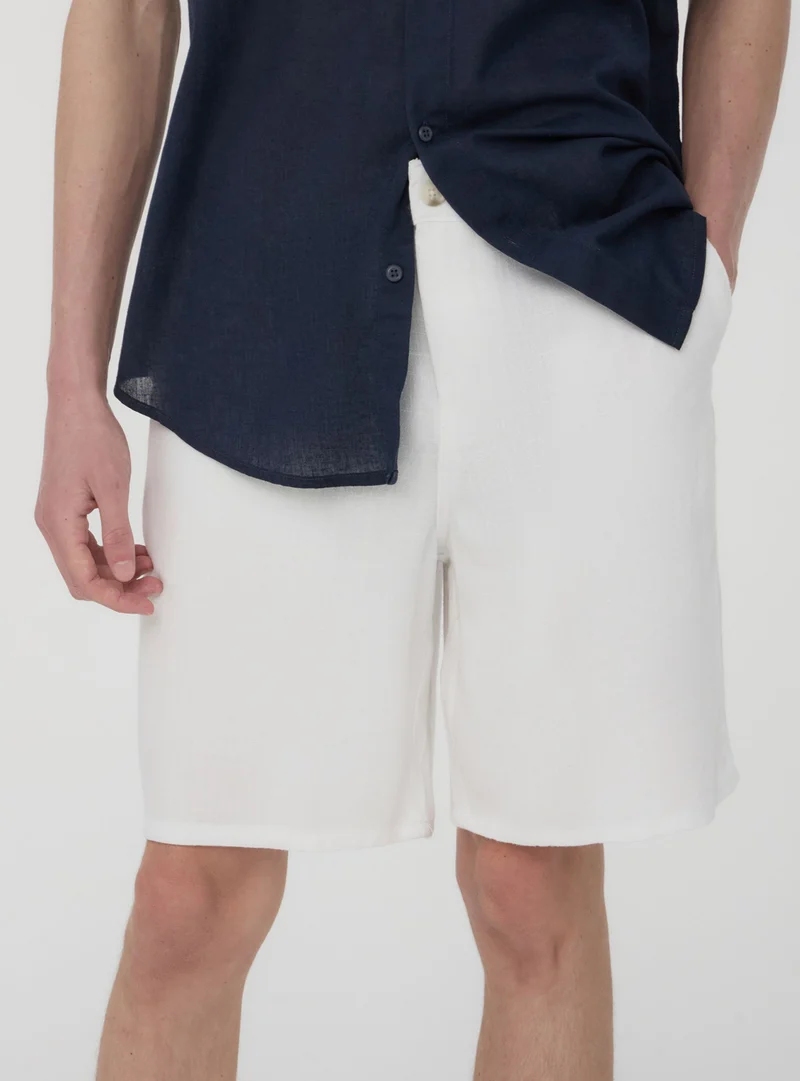 Pantaloncini chino in misto lino