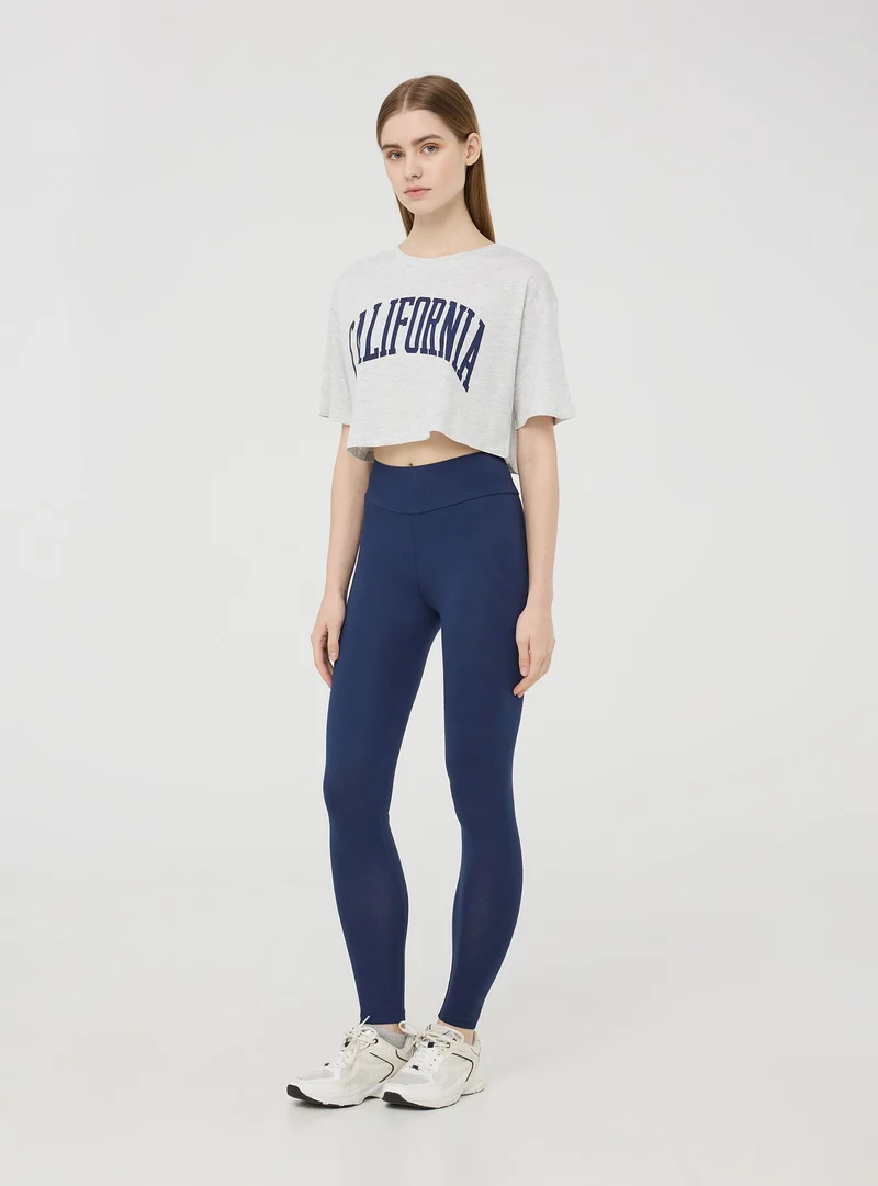 Leggings lunghi a vita alta tinta unita