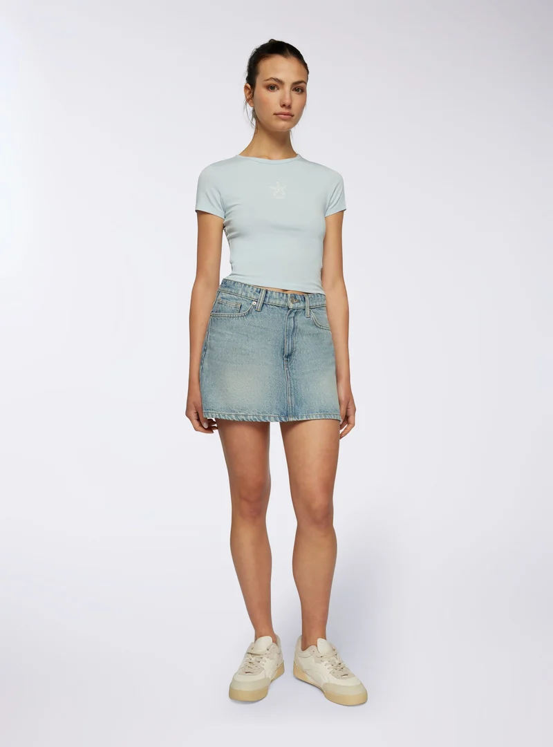 T-shirt crop con stampa stella marina