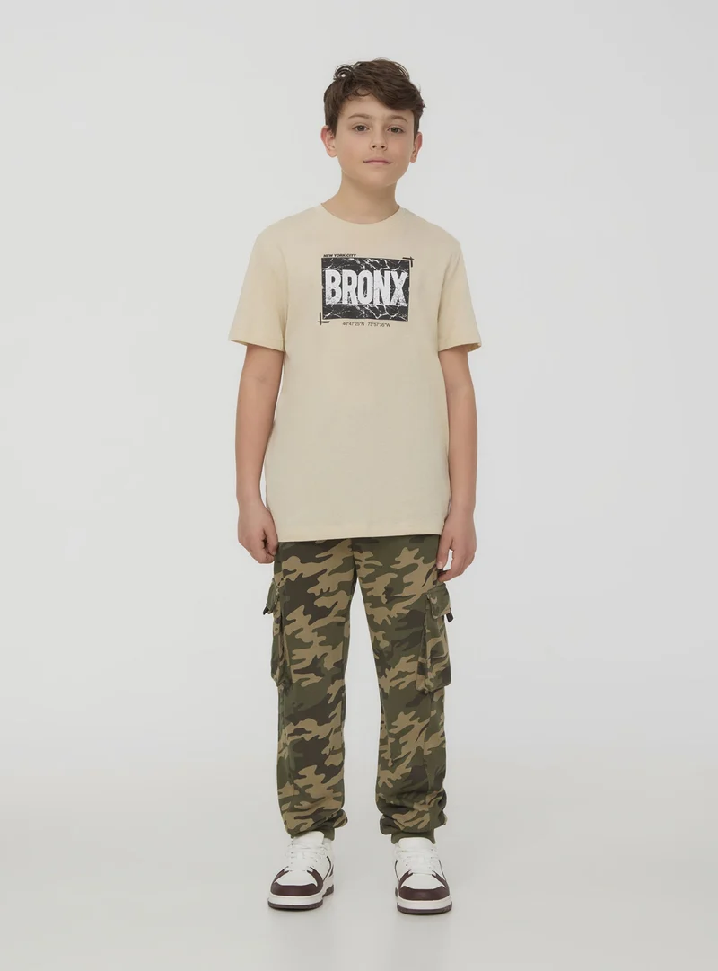T-shirt con scritta
