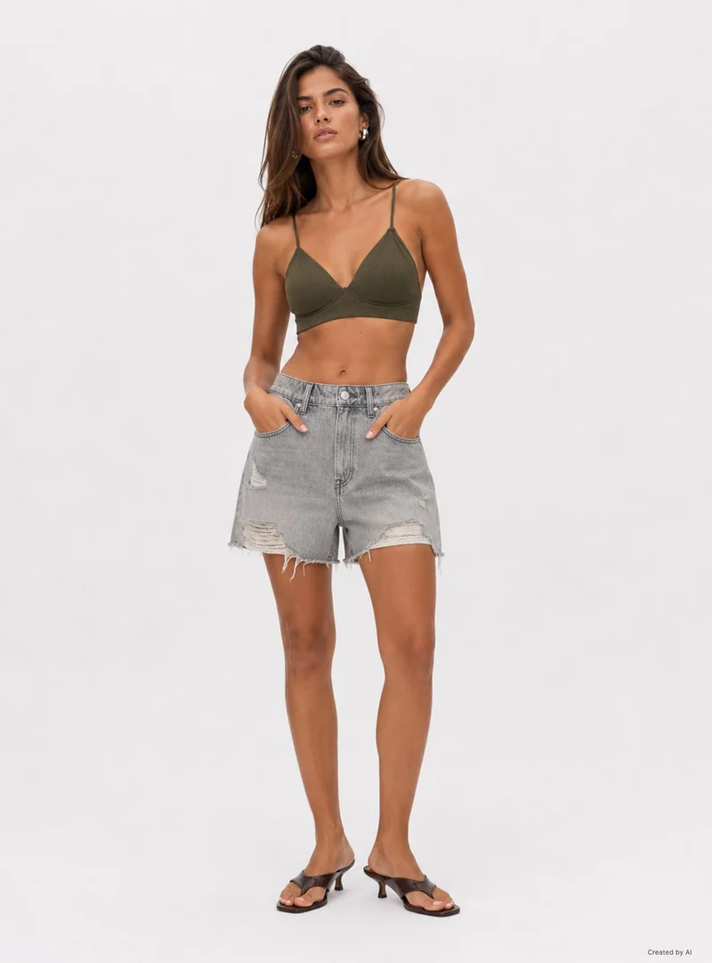 Bermuda in jeans con strappi