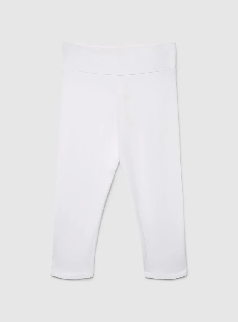 Leggings capri a tinta unita