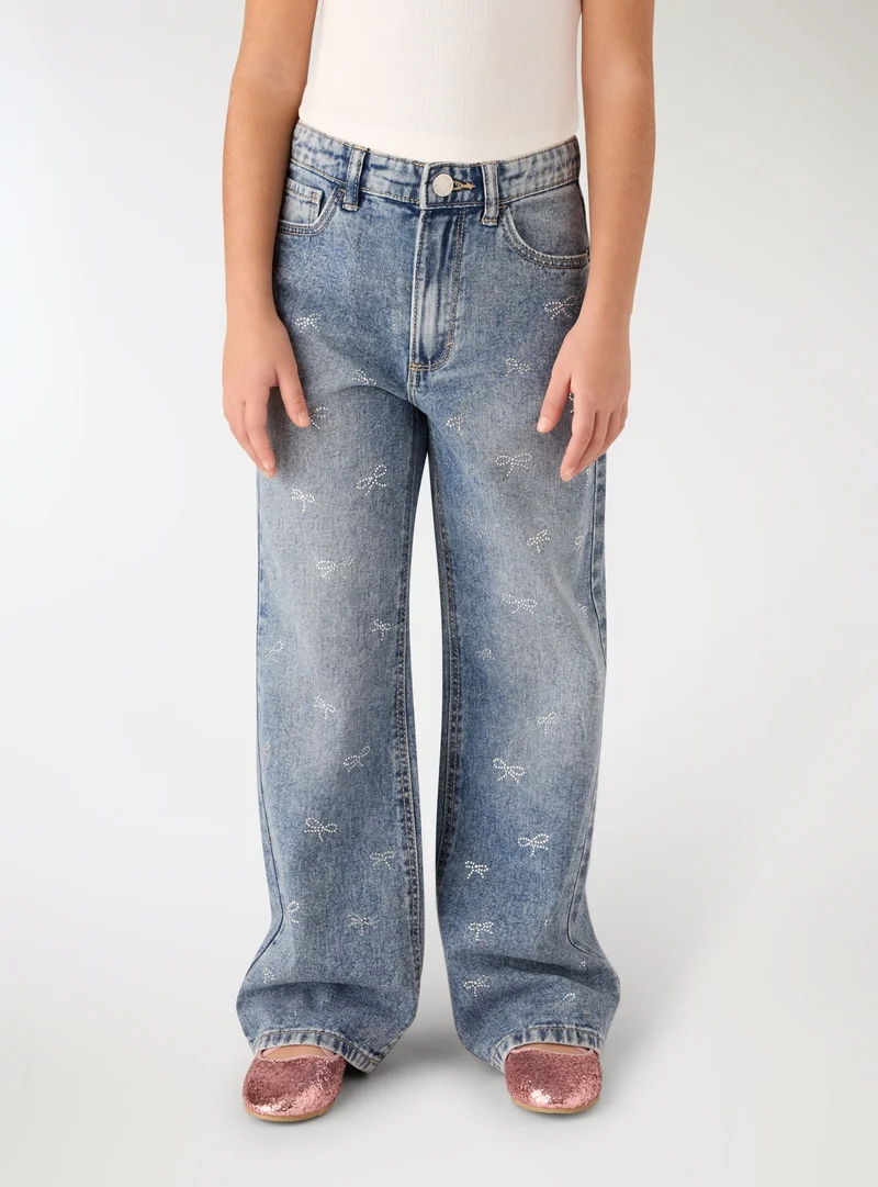 Jeans wide leg con applicazioni