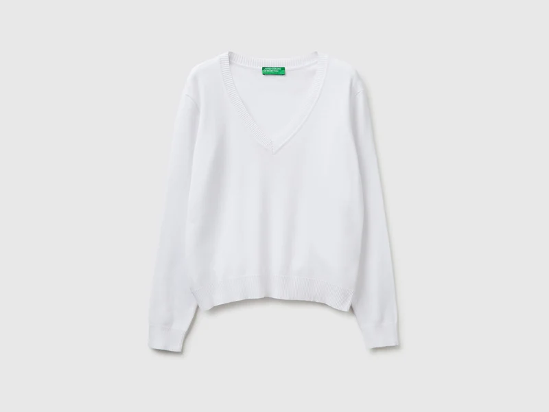 Maglia bianca in cotone tricot con scollo a V