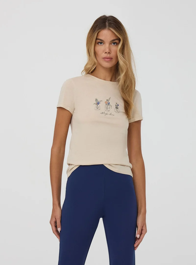 T-shirt slim fit con stampa fiori