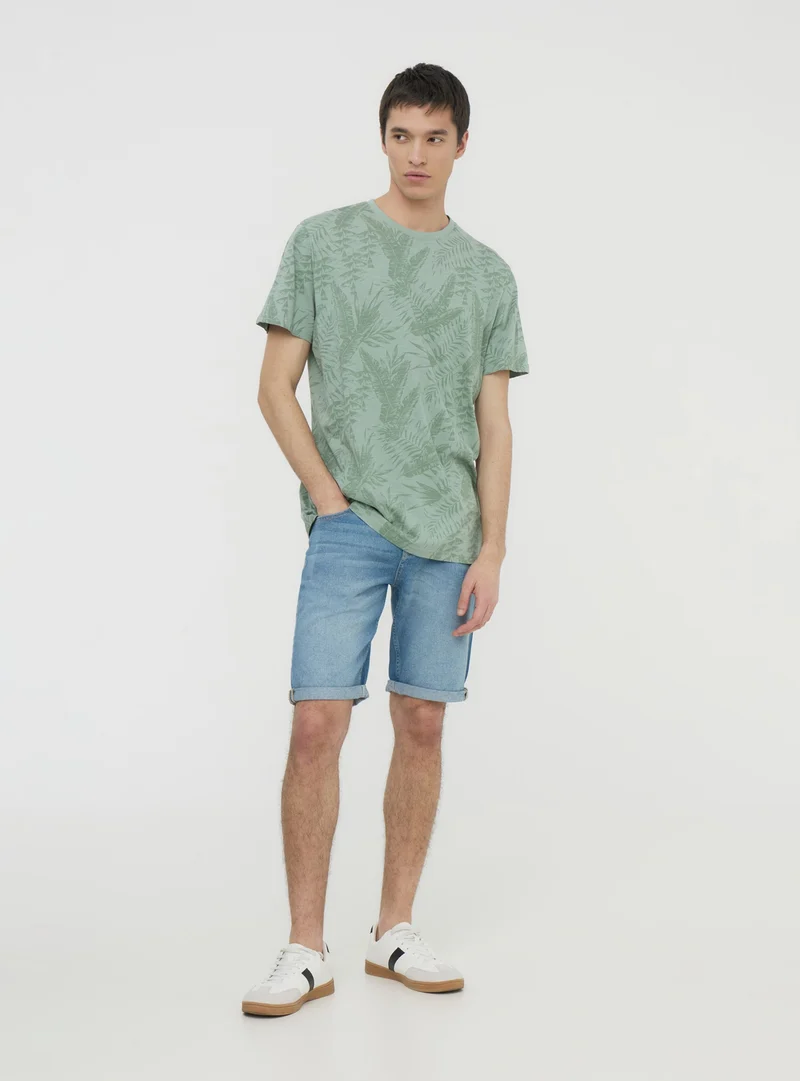 T-shirt con stampa palme all-over