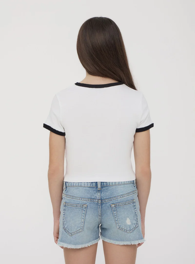 T-shirt con scritta e profili a contrasto
