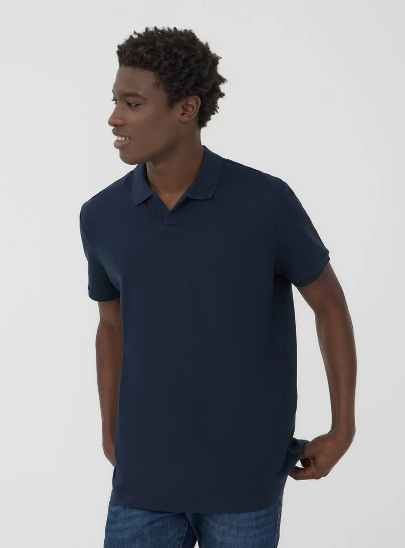 Polo basic tinta unita