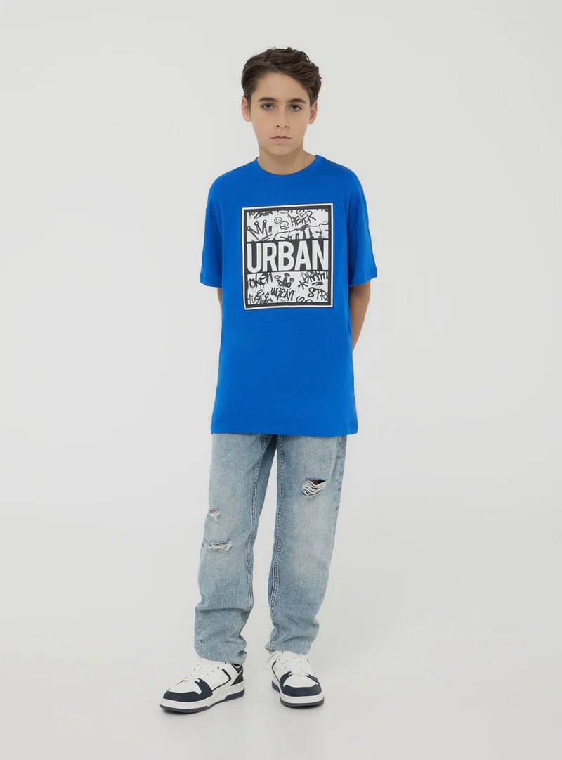 T-shirt stampa stile graffiti