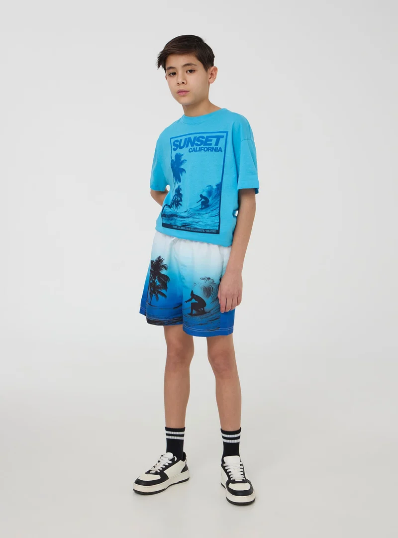 T-shirt stampa tema surf