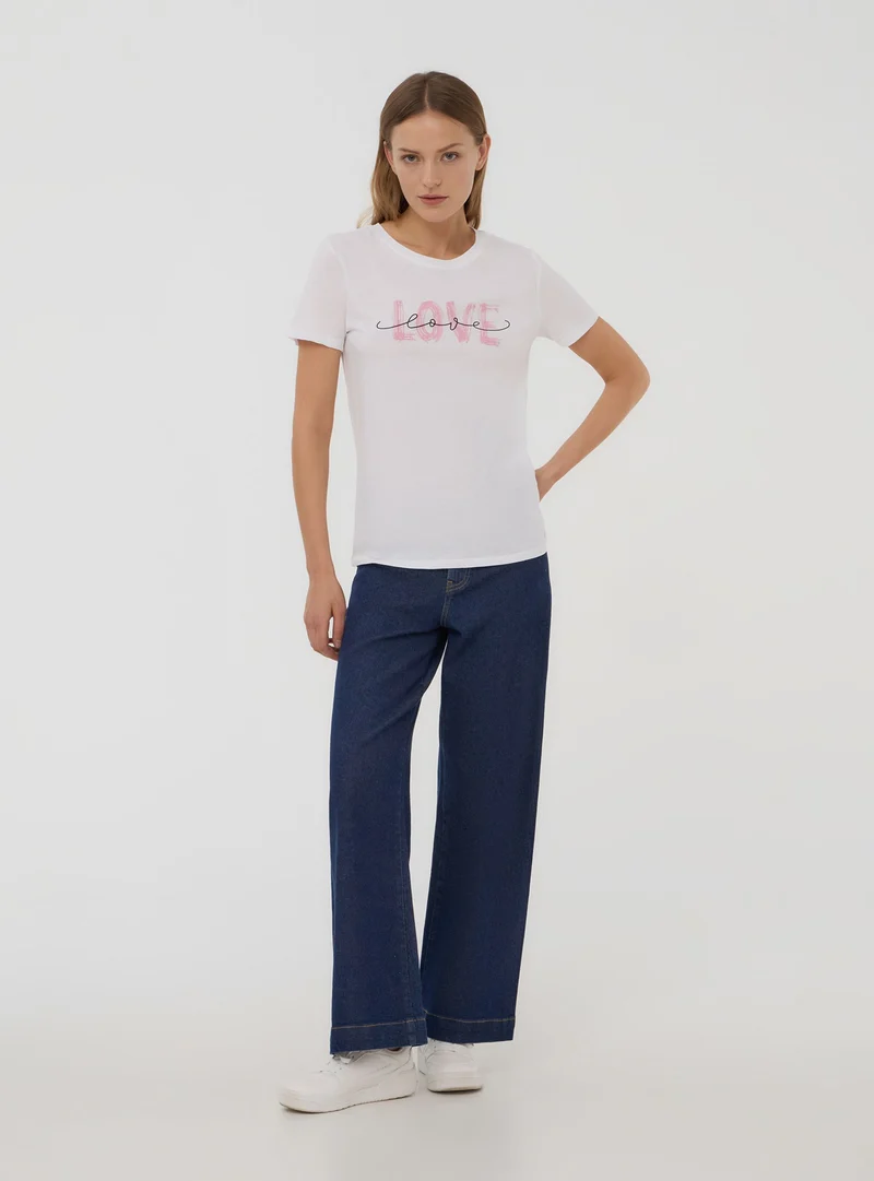 T-shirt scritta love