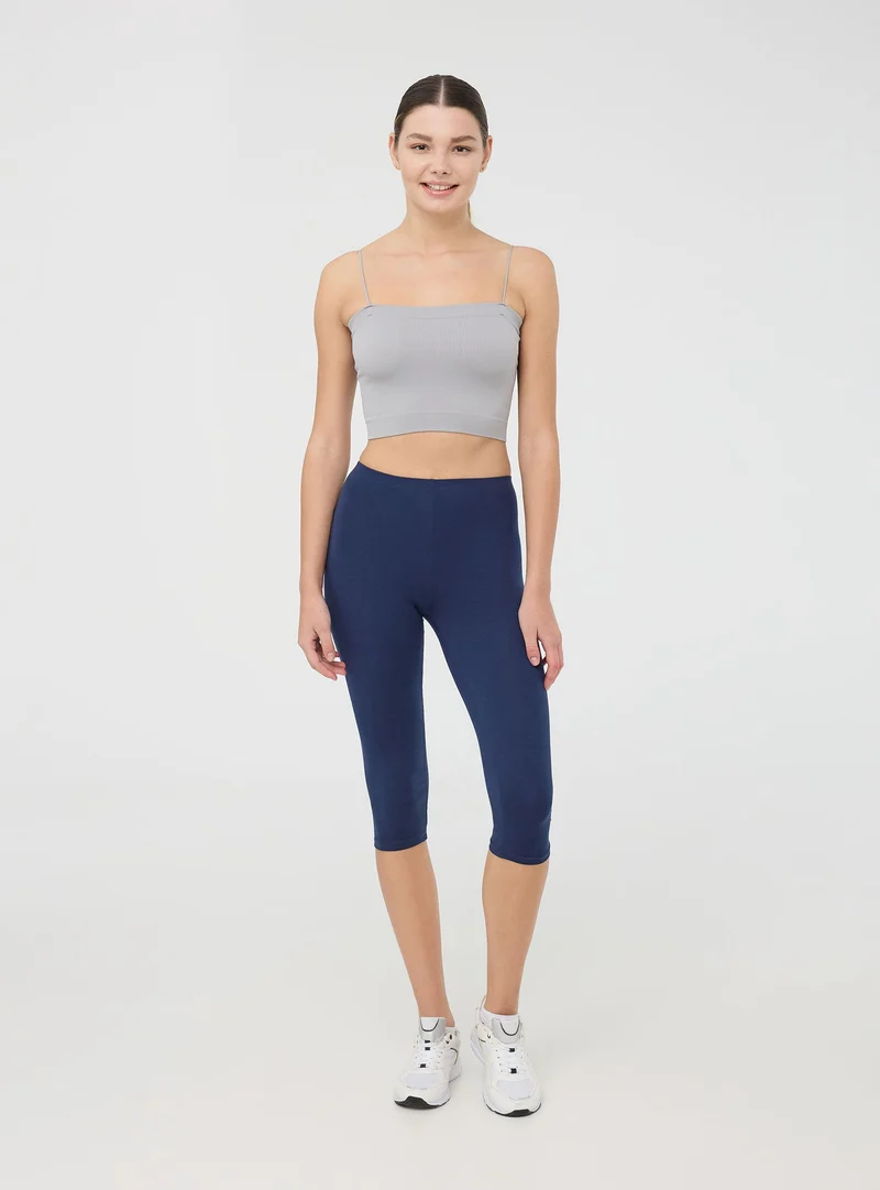 Leggings tre quarti tinta unita