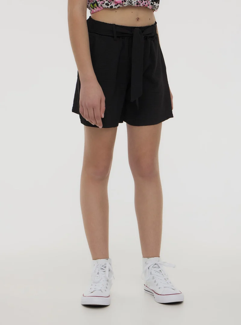 Shorts tinta unita con fusciacca