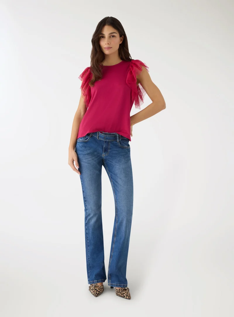 Jeans a zampa con cinta