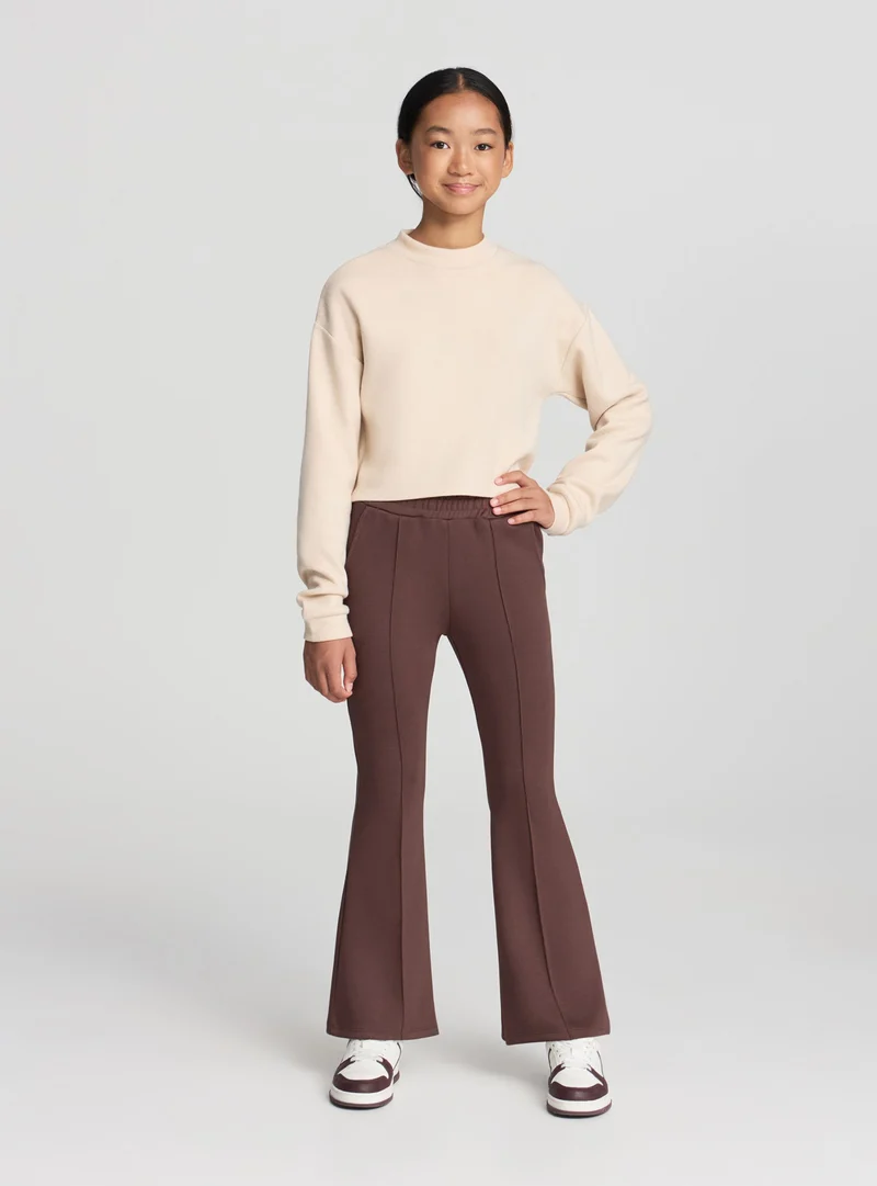 Maglietta crop con collo lupetto in tessuto caldo