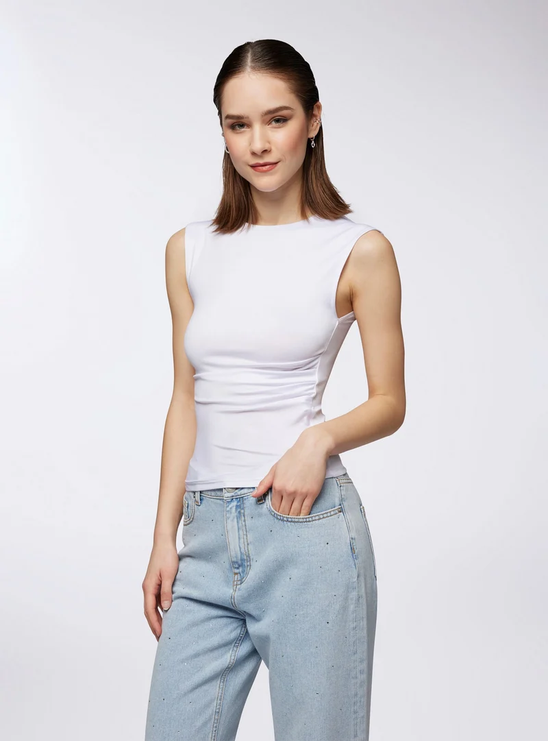 T-shirt maniche ad aletta con arriccio