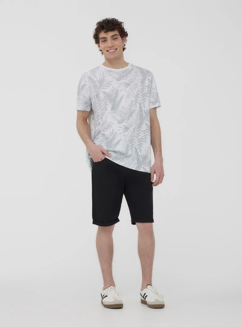T-shirt con stampa palme all-over