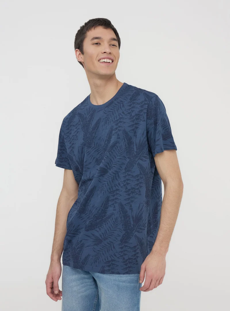T-shirt con stampa palme all-over