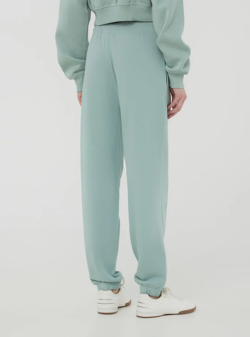 Pantaloni della tuta a vita alta con polsini