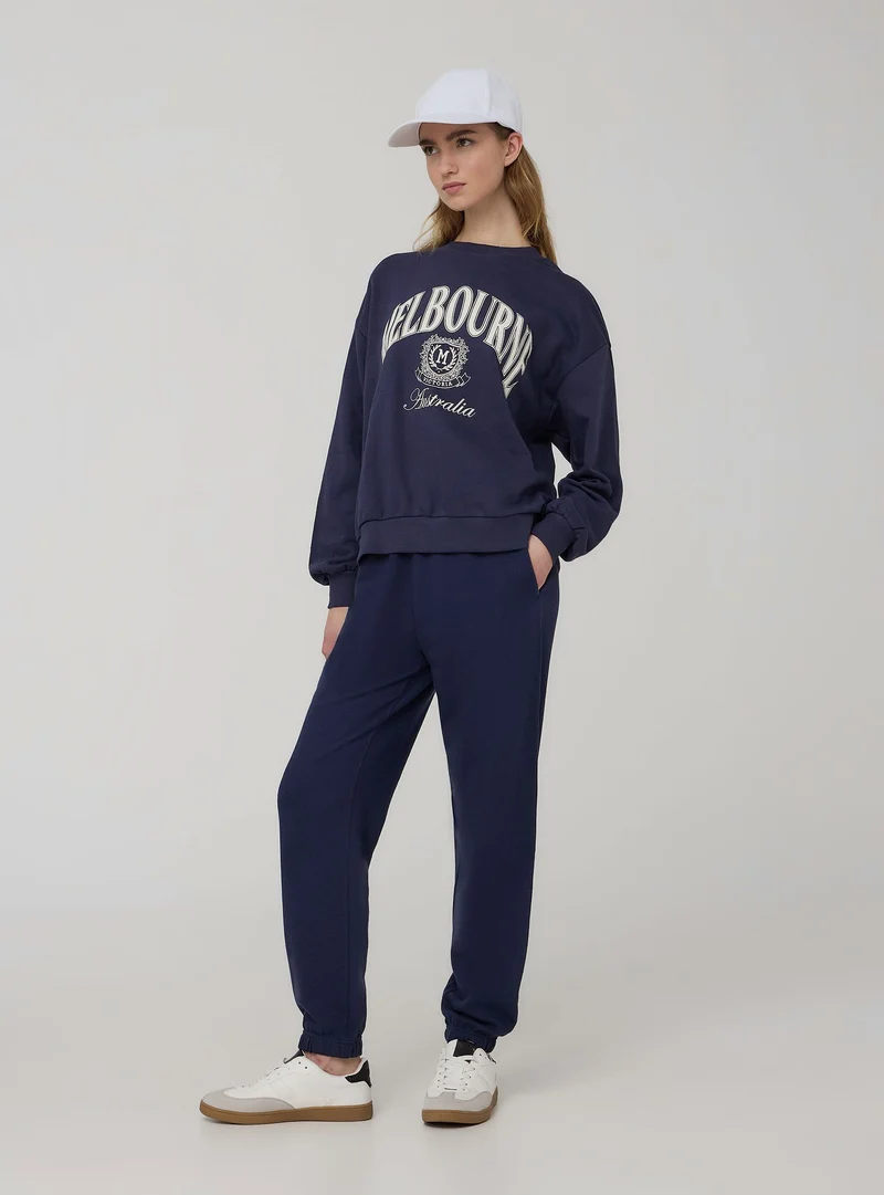 Pantaloni della tuta a vita alta con polsini