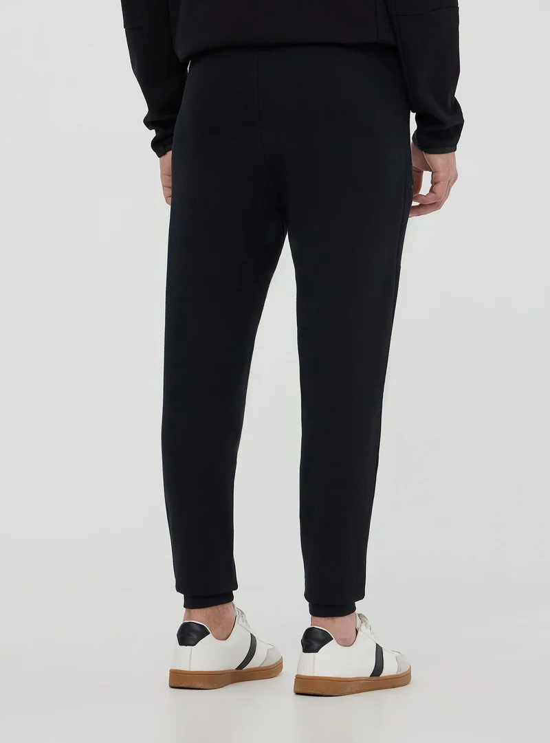 Pantaloni tuta tecnici