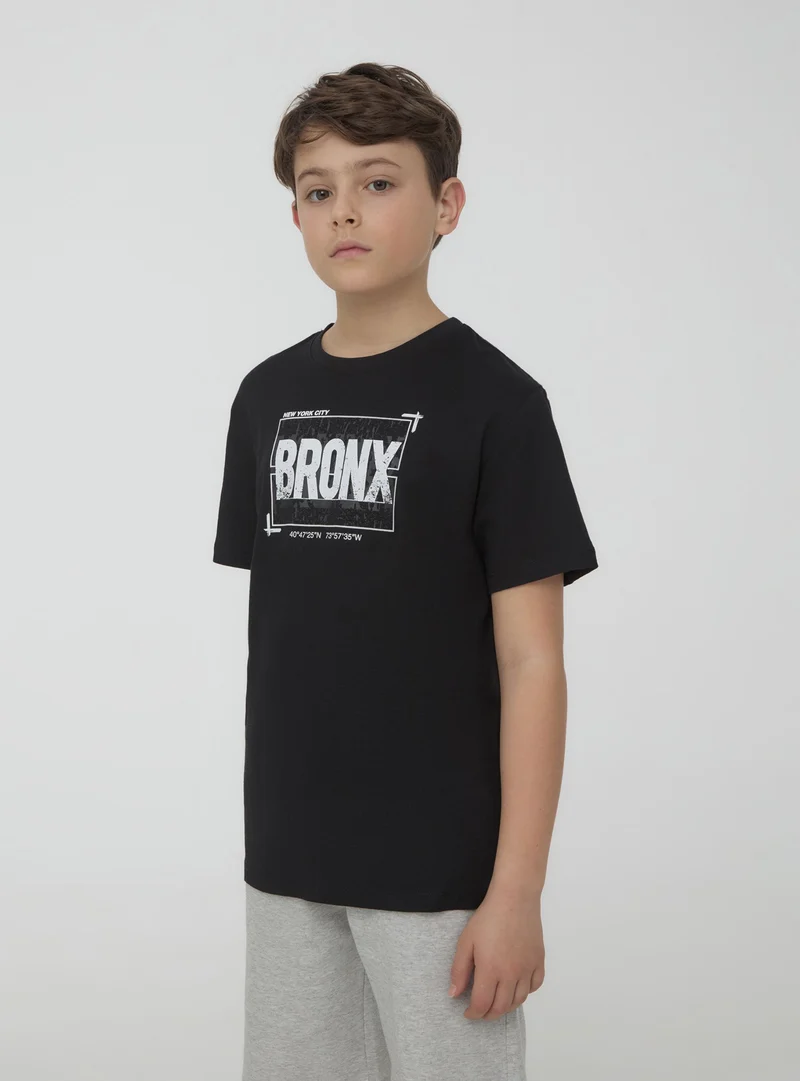 T-shirt con scritta