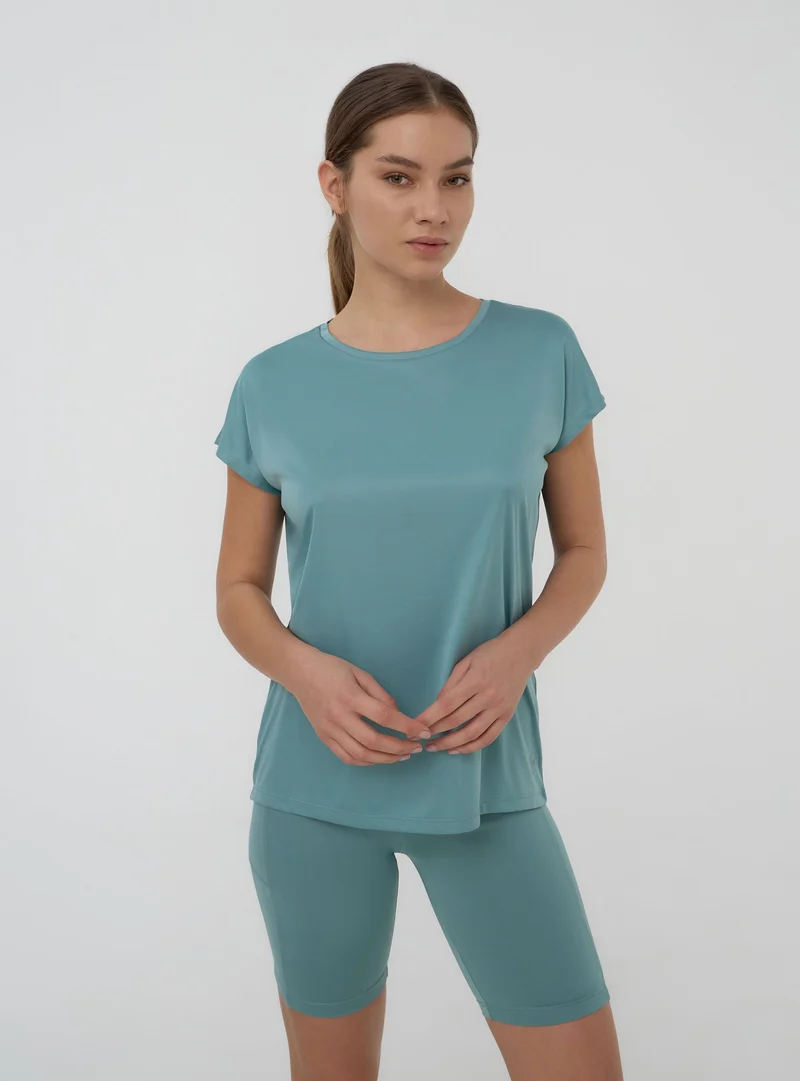 T-shirt sportiva ampia tinta unita