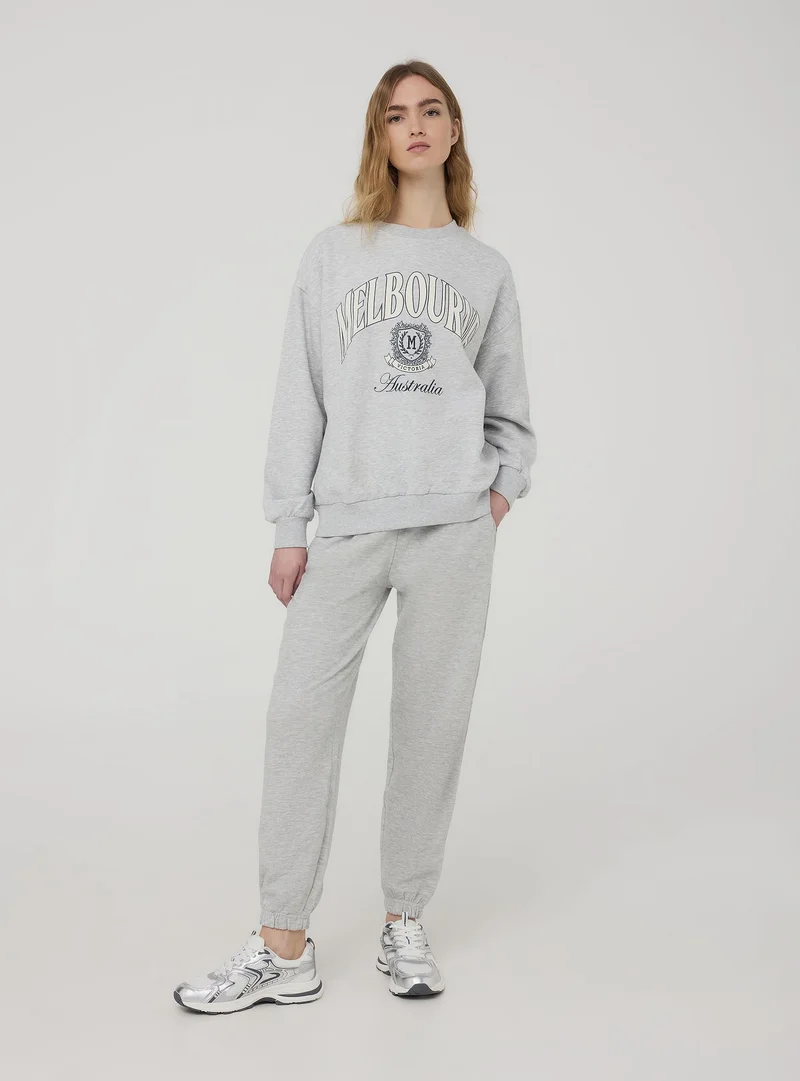 Pantaloni della tuta a vita alta con polsini