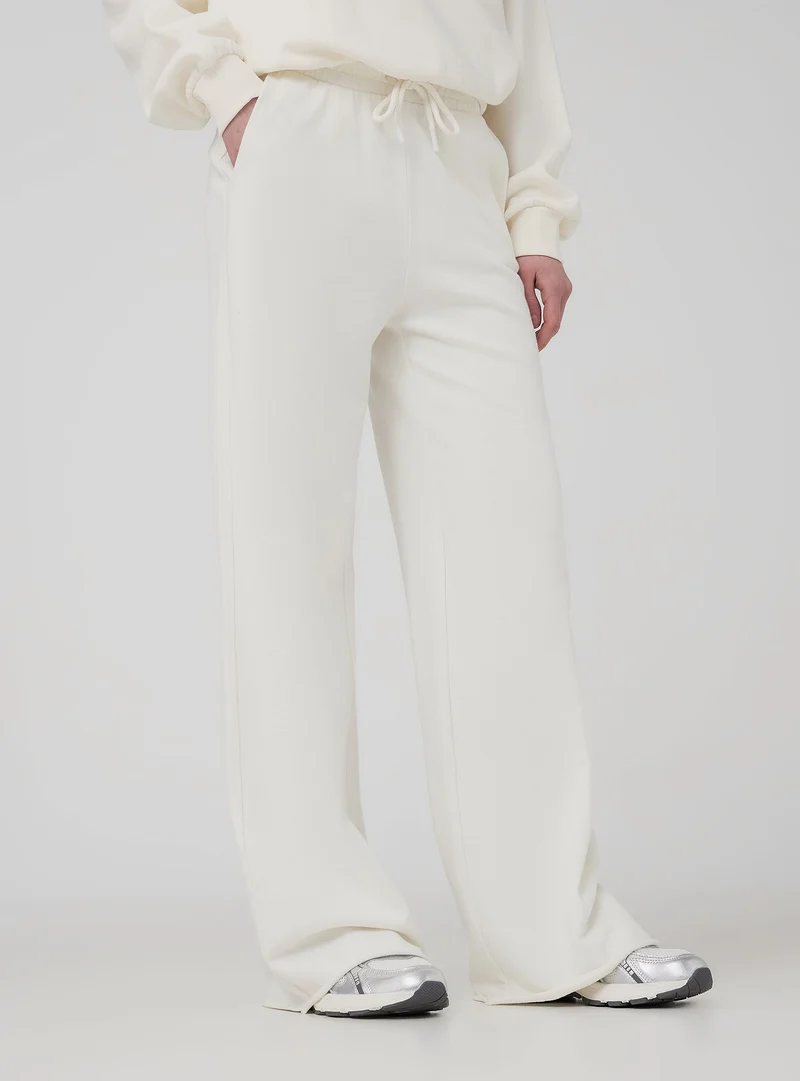 Pantaloni tuta wide leg con coulisse