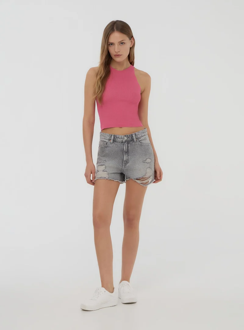 Shorts di jeans mom fit con strappi ampi