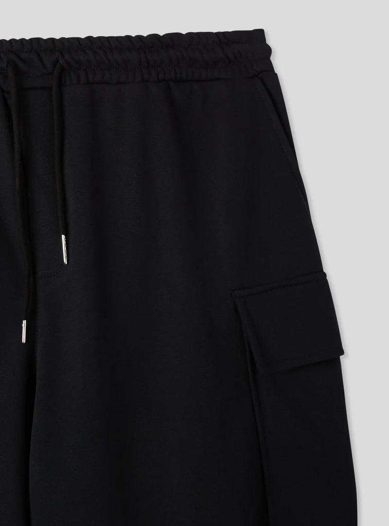 Pantaloncini baggy cargo con coulisse
