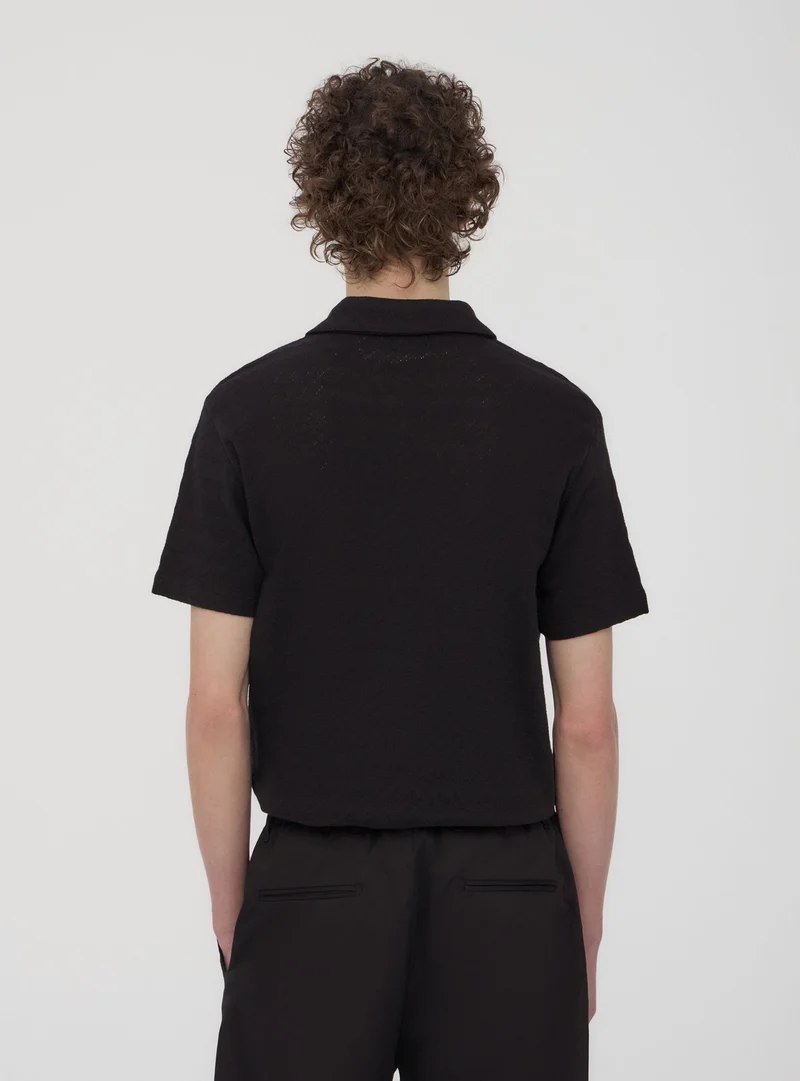 T-shirt polo lavorata
