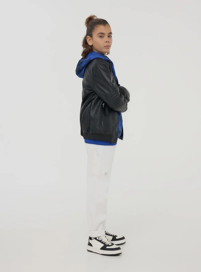Giacca biker in similpelle con tasche con zip