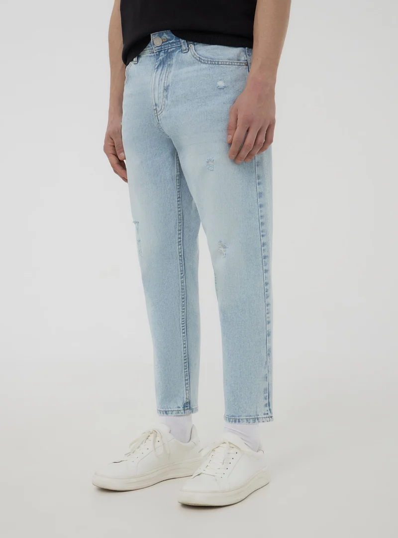 Jeans con strappi piccoli loose fit