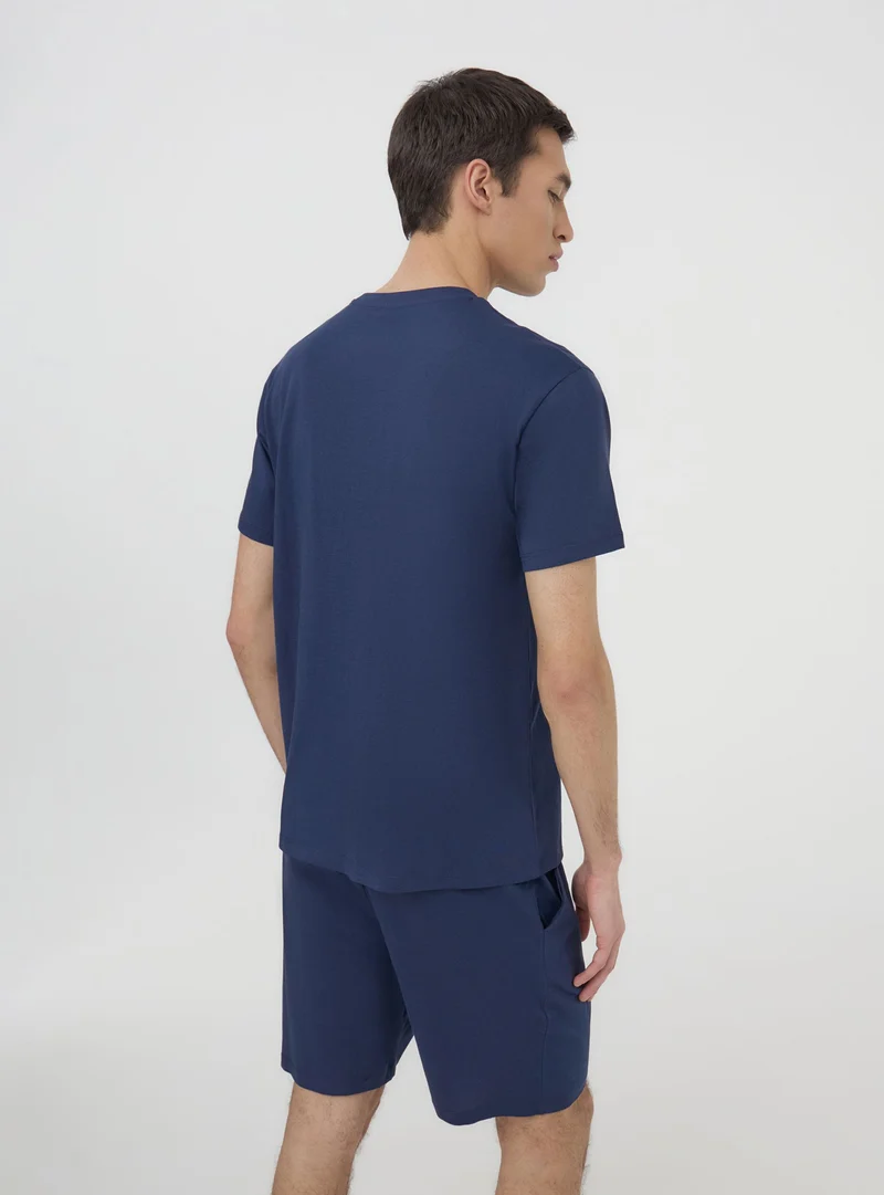 Set pigiama t-shirt con taschino a righe e bermuda