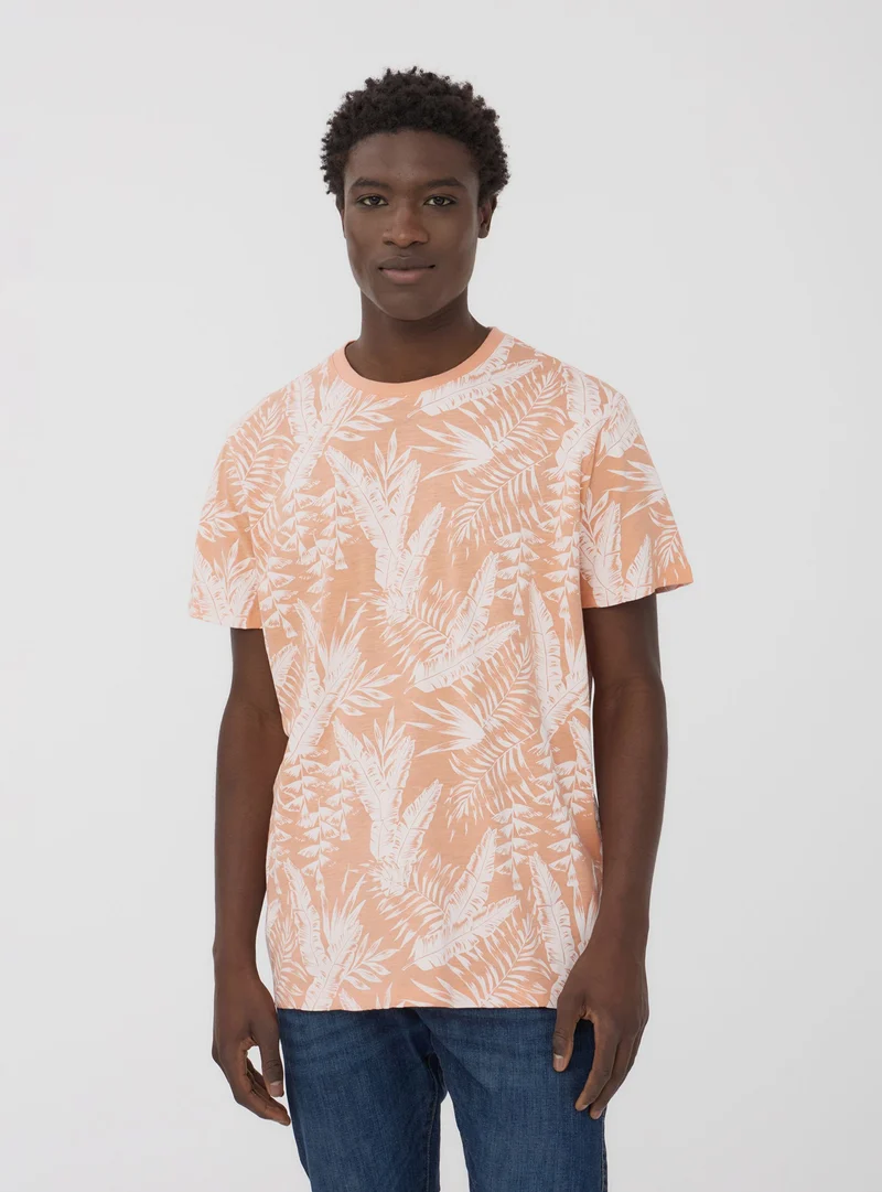 T-shirt con stampa palme all-over