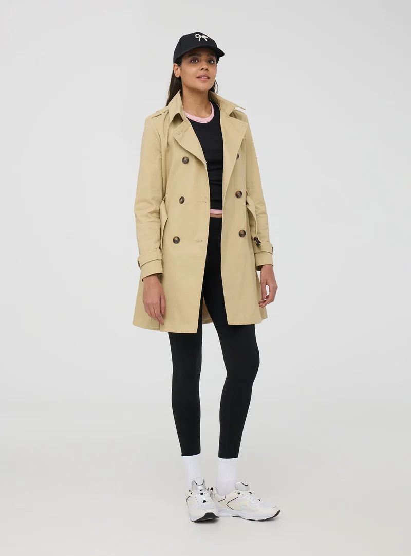 Trench con cintura a tinta unita