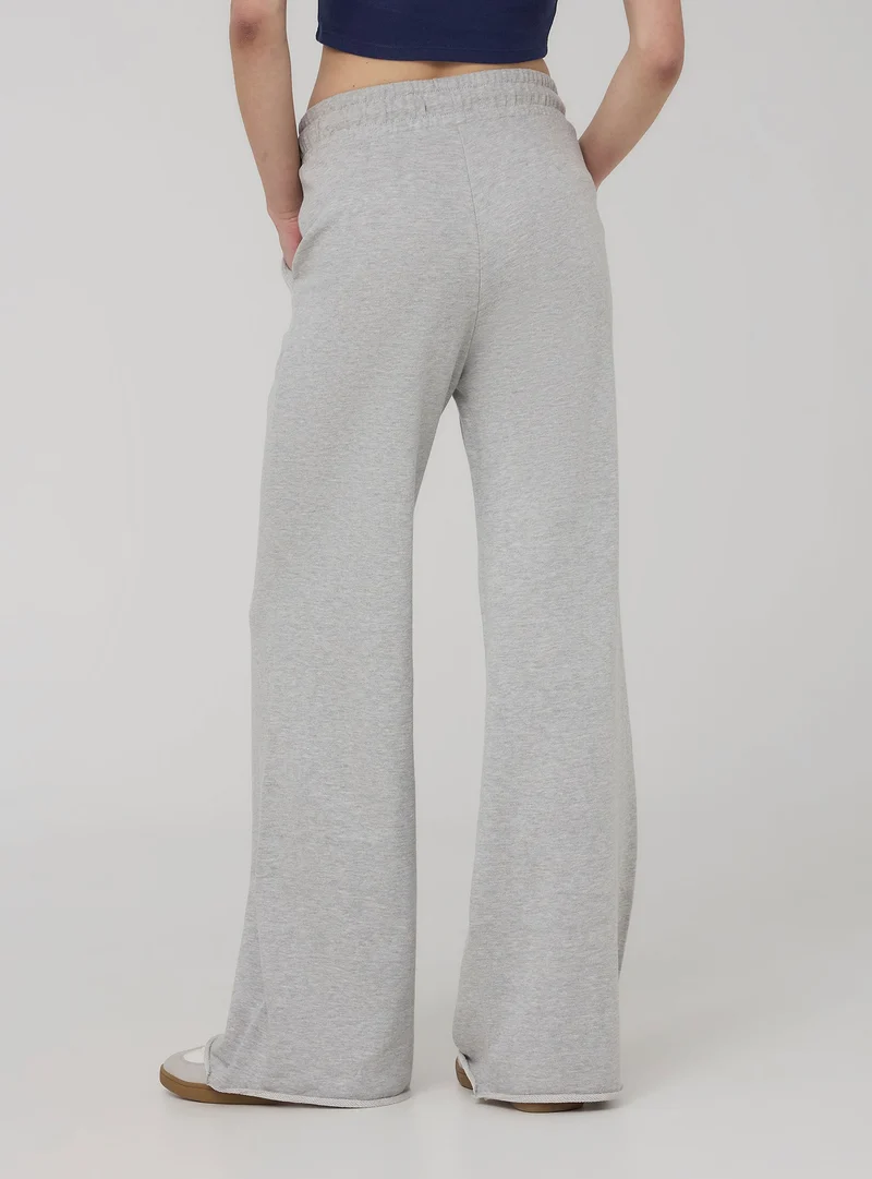 Pantaloni tuta wide leg con coulisse