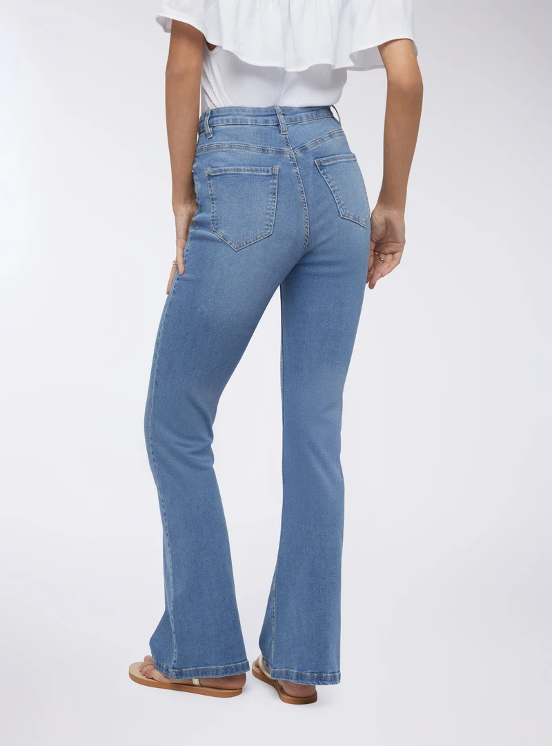 Jeans a zampa a vita alta lavaggio medio