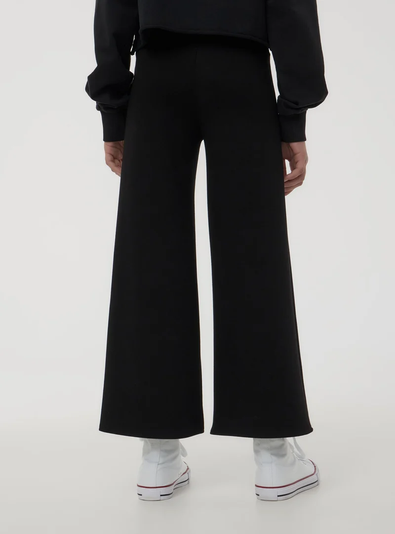 Pantaloni wide leg tinta unita