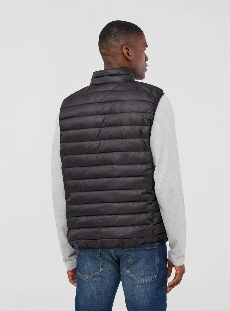 Gilet 100 grammi con collo alto
