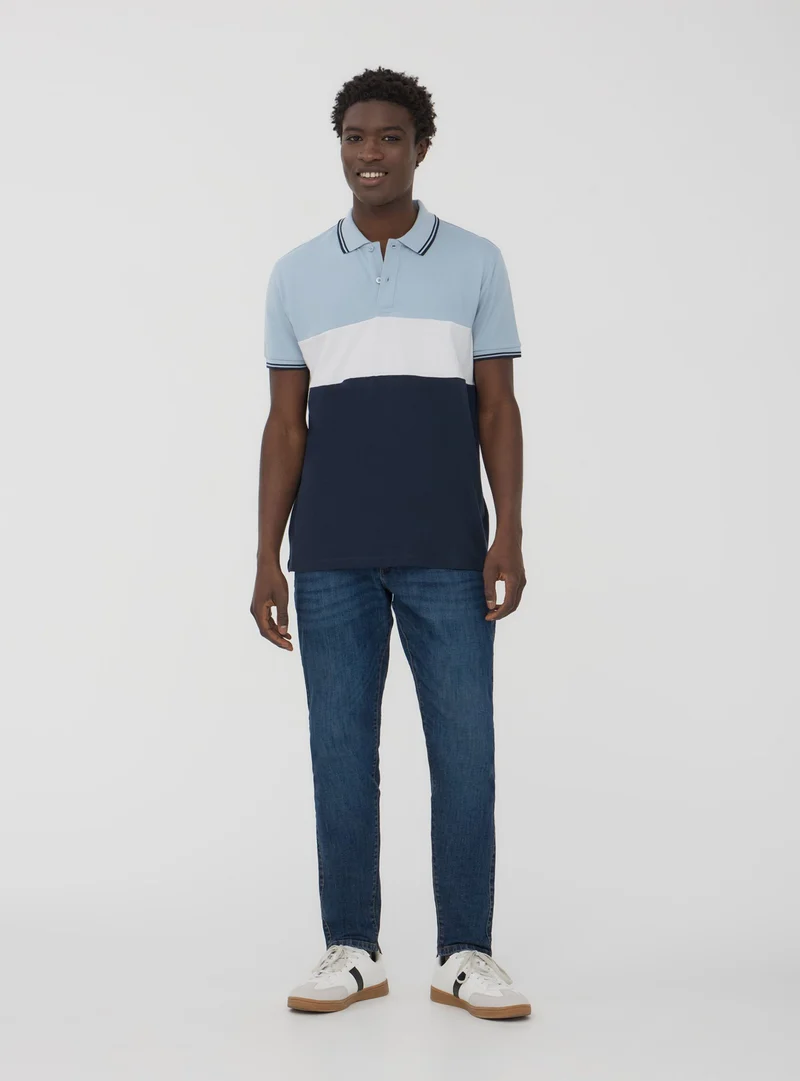 Polo in piquet block color