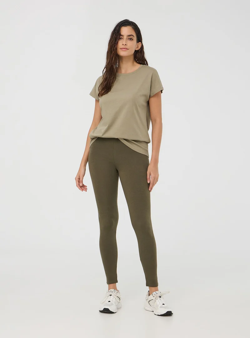 Leggings lunghi tinta unita in jersey stretch