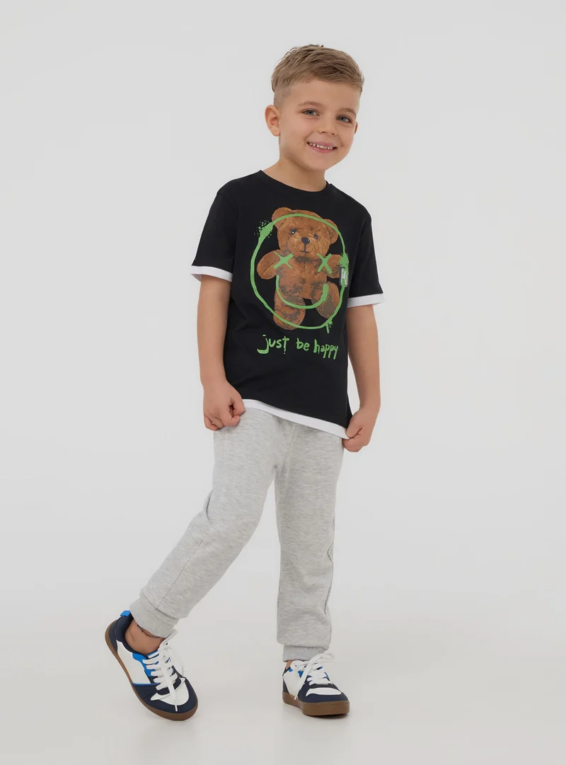 T-shirt con stampa simpatico orsetto