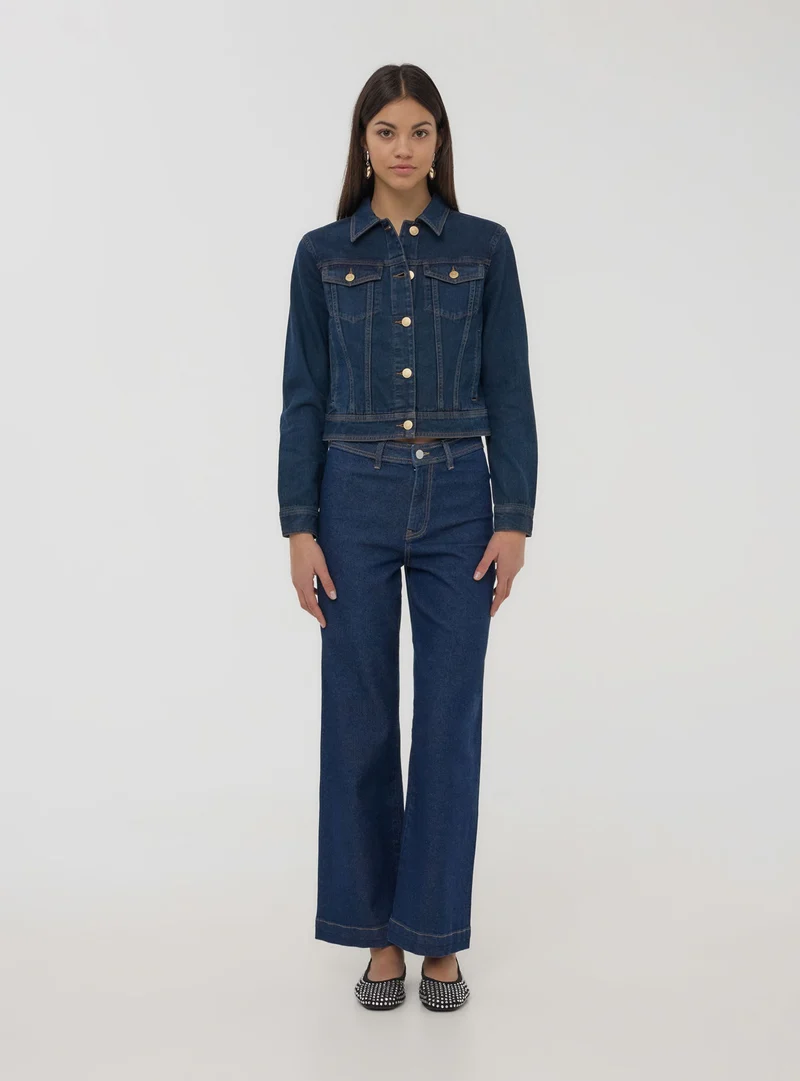 Giubbino di jeans scuro con tasche