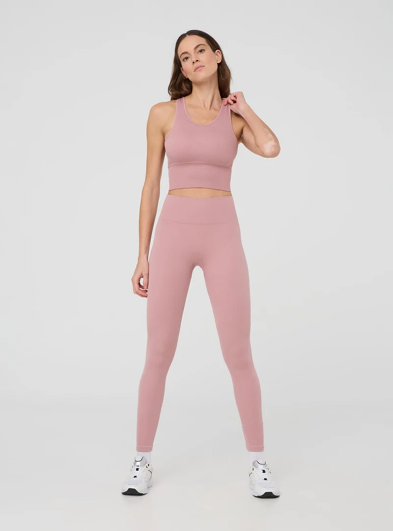Leggings sportivi a costine con arriccio sul retro