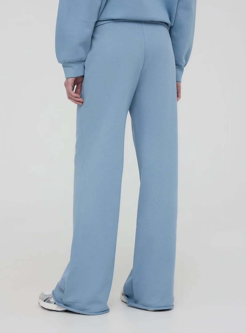 Pantaloni tuta wide leg con coulisse