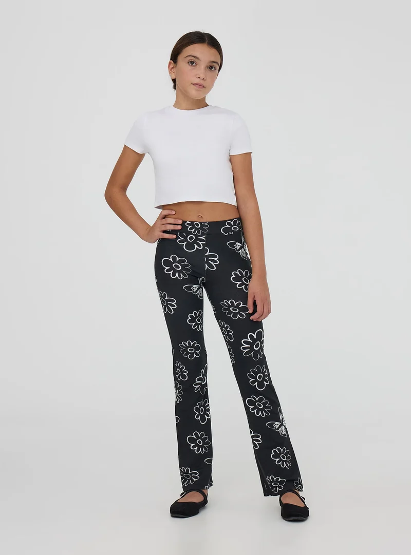 Leggings lunghi a zampa fantasia floreale