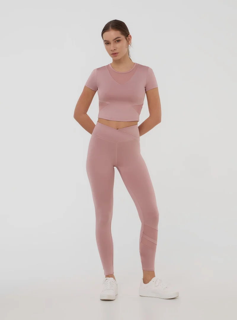 Leggings sportivi con inserto in tulle